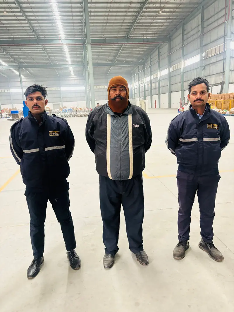 VSS security staff in winter uniforms at a warehouse